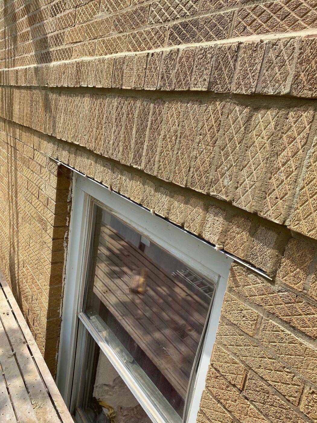 Replaced steel lintel above a window